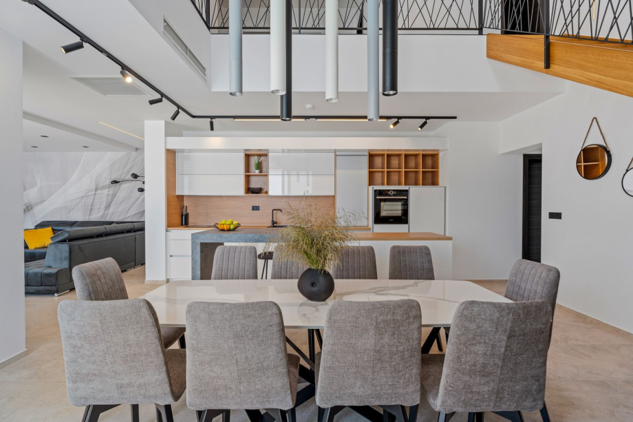 Very comfortable living room (32sqm) with sofas, flat screen TV, PS5, Bluetooth speaker system, all fully air-conditioned.