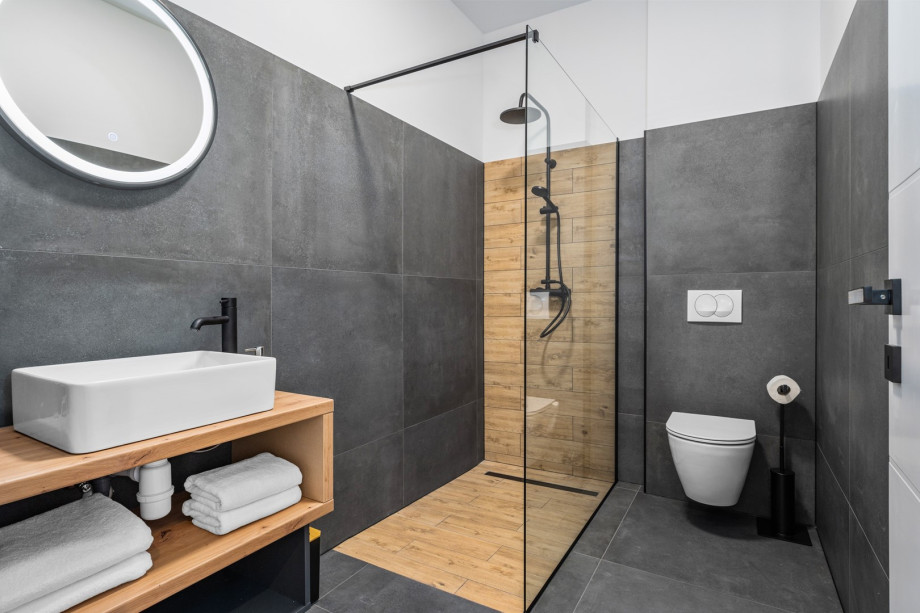 A Family bathroom (5,6sqm) with a shower that is used by Bedroom NO3 and Bedroom NO4.