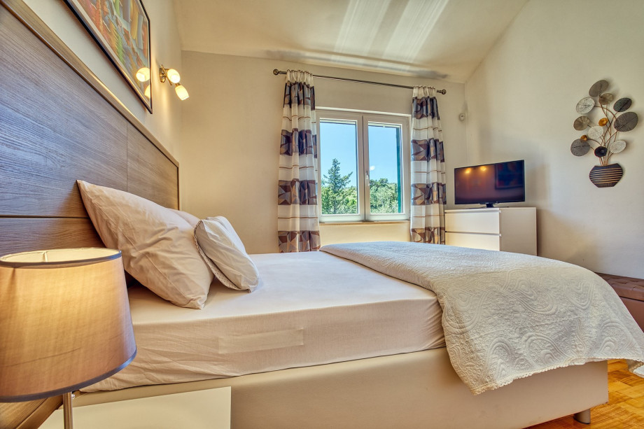 Bedroom No2 also offers a TV, and an A/C