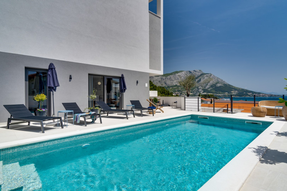 Private heated pool with hydromassage, amazing sea views from every room