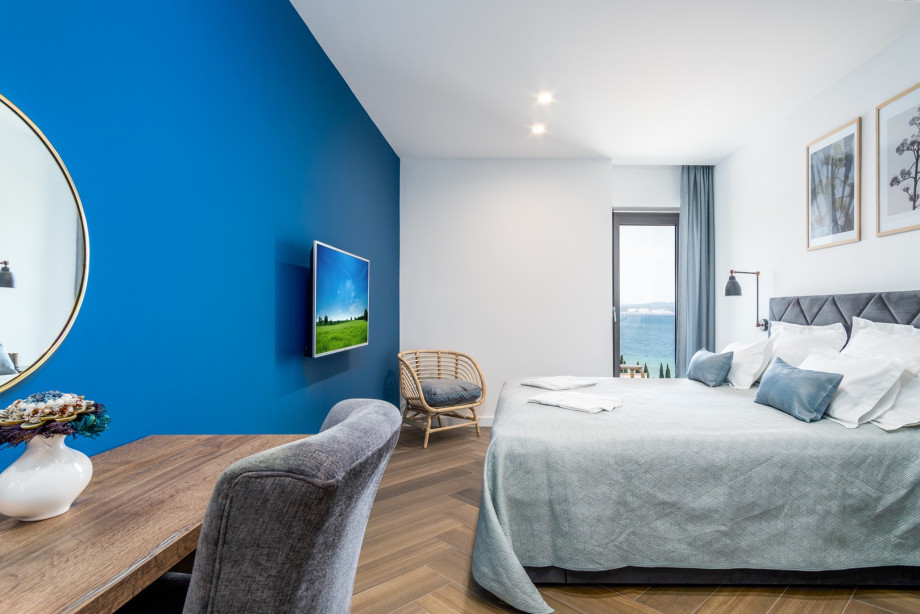 Bedroom No2 with a king-size bed 180 x 200cm, TV, A/C, en-suite bathroom with a shower, a balcony