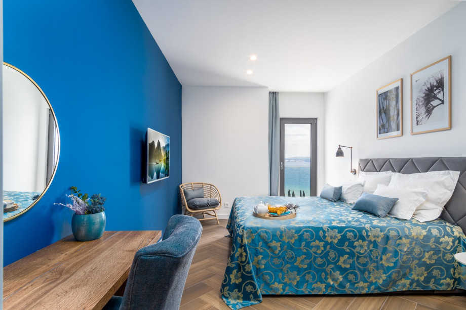 Bedroom No4 with a king-size bed 180 x 200cm, TV, A/C, en-suite bathroom with a shower, a balcony