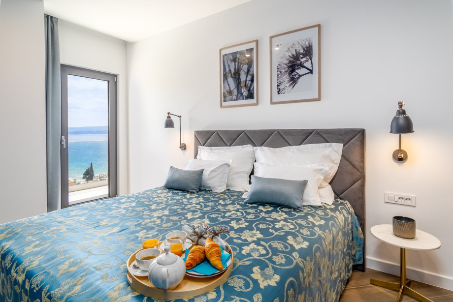 Bedroom No4 with a king-size bed 180 x 200cm, TV, A/C, en-suite bathroom with a shower, a balcony