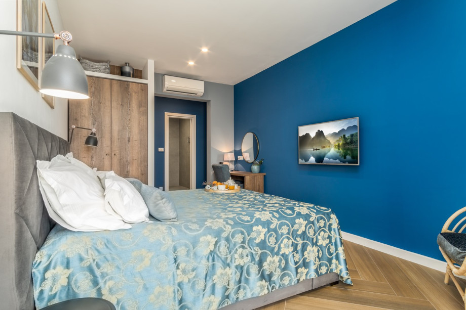 Bedroom No4 with a king-size bed 180 x 200cm, TV, A/C, en-suite bathroom with a shower, a balcony