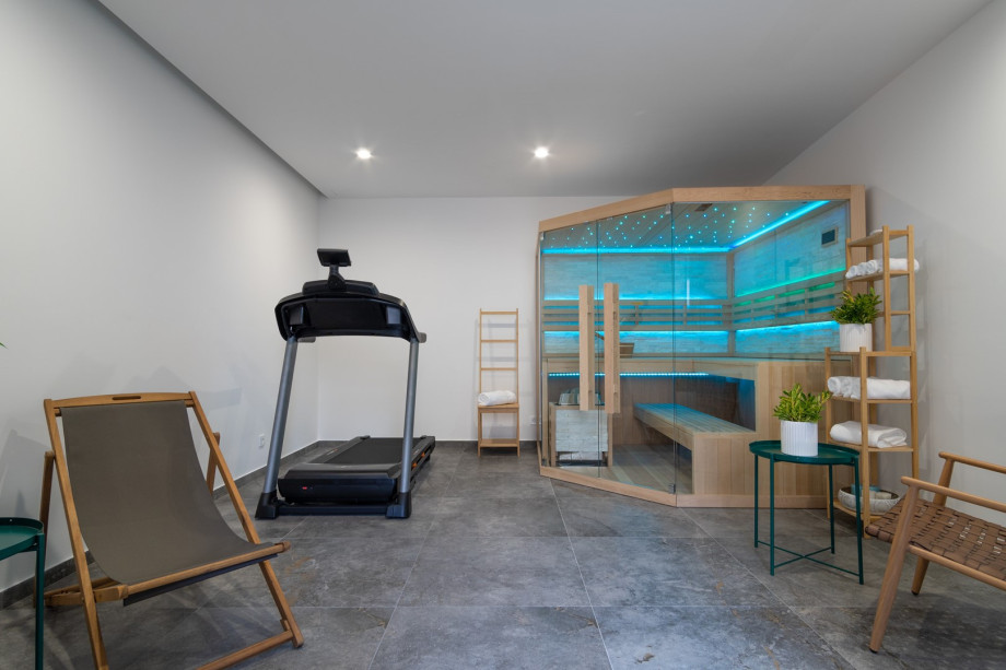 Finnis sauna, a Treadmill, walk-in shower, and a separate toilet