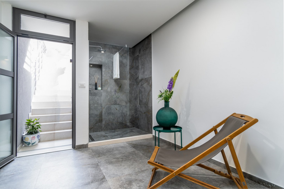 Finnis sauna, a Treadmill, walk-in shower, and a separate toilet