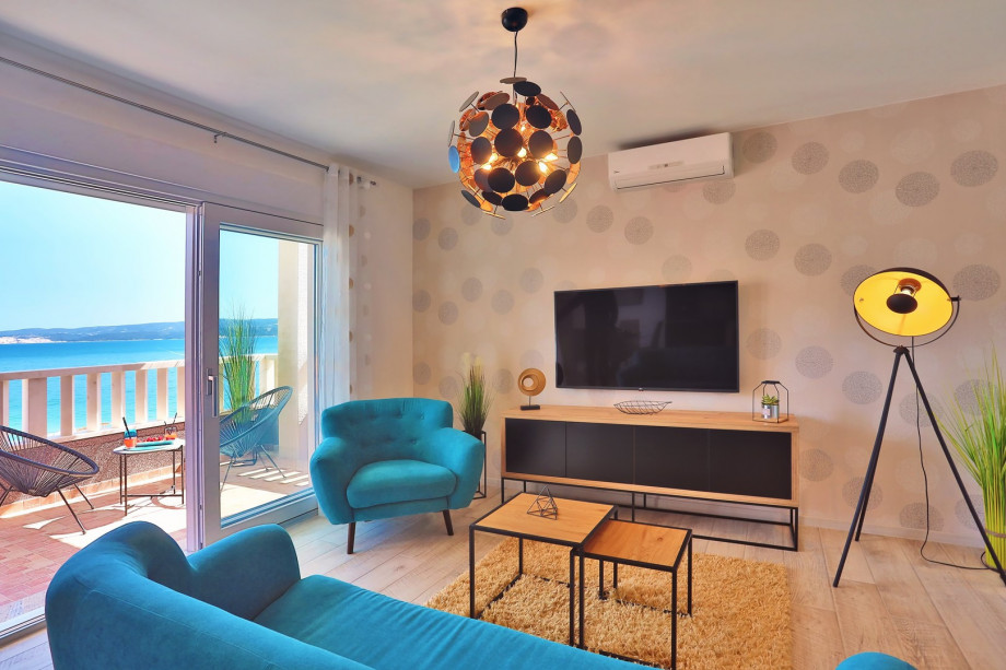 Living and dining area with covered terrace at 2nd floor