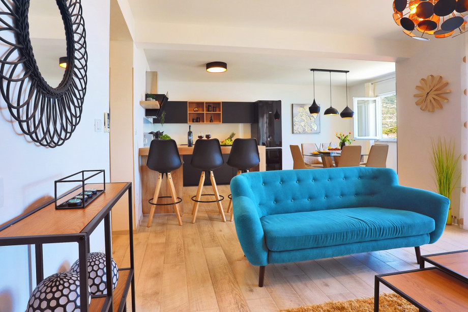 Living and dining area with covered terrace at 2nd floor