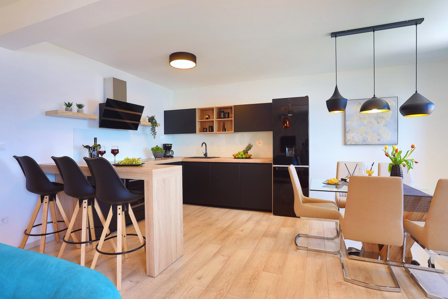 Fully equipped kitchen with dining area on the 2nd floor