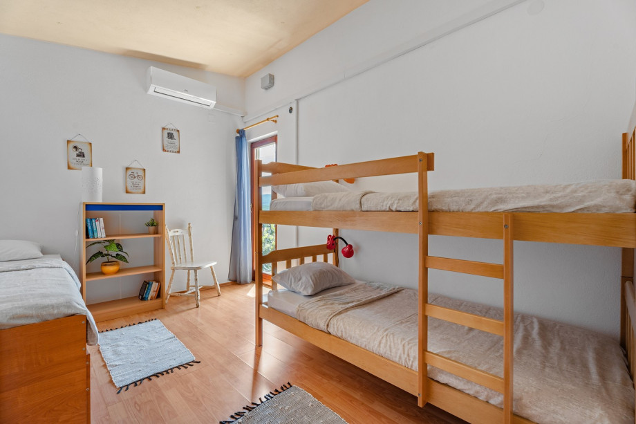 Bedroom No.3 with 1 single bed, and a bunk bed, AC, exit to terrace
