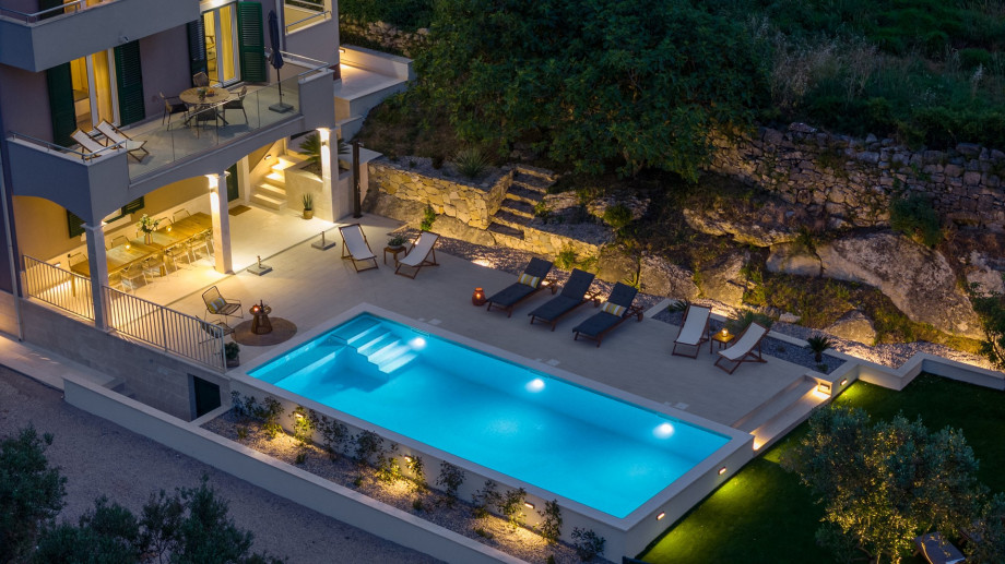 This exquisite 6-bedroom villa offers the epitome of luxury and relaxation