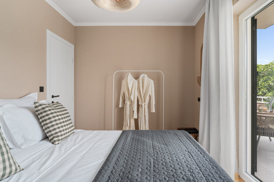The third bedroom features a 180cm by 200cm king-size bed