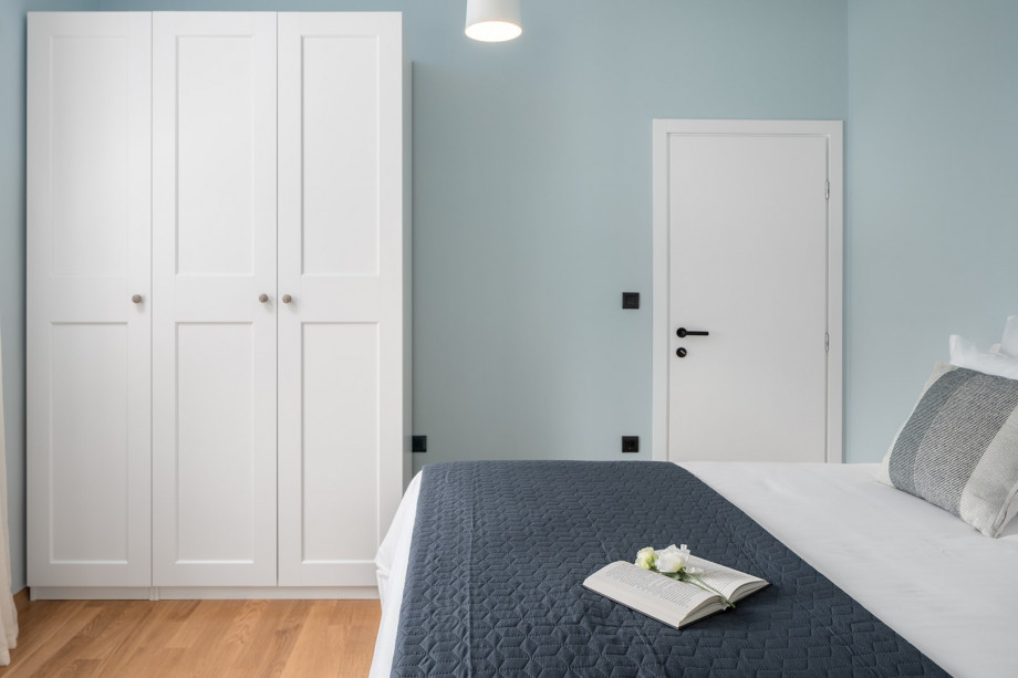 The first bedroom has an attached bathroom with a queen-size bed that measures 160 by 200 cm