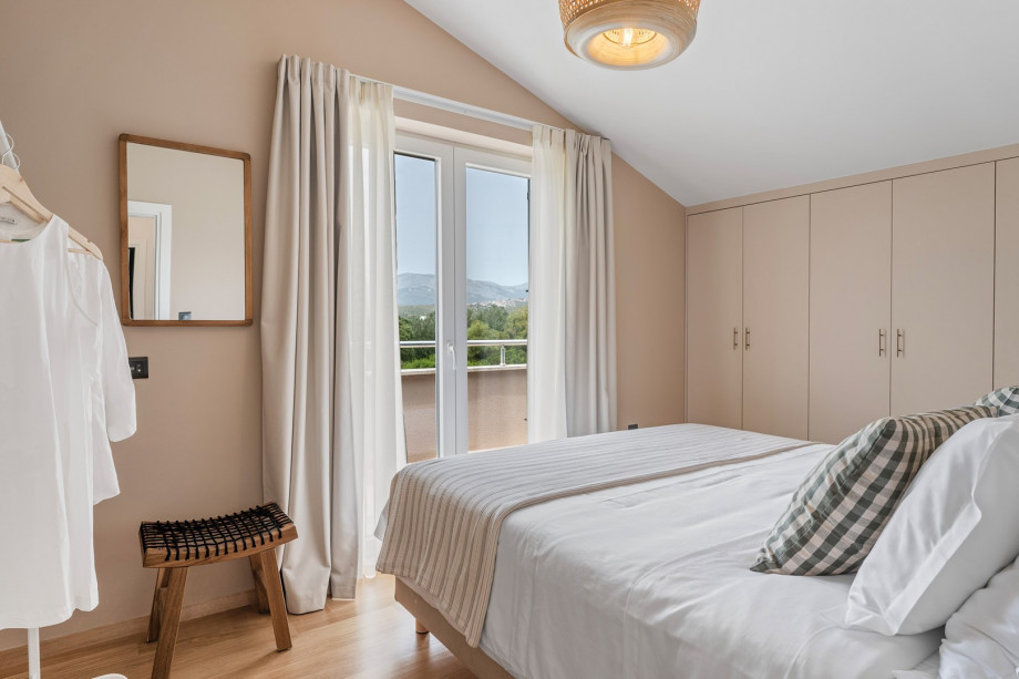 Third bedroom with a king size bed, and with pool views