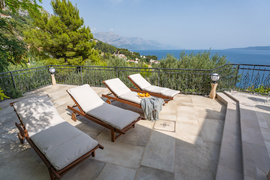 Pool area with 8 deck chairs, all exclusively for you