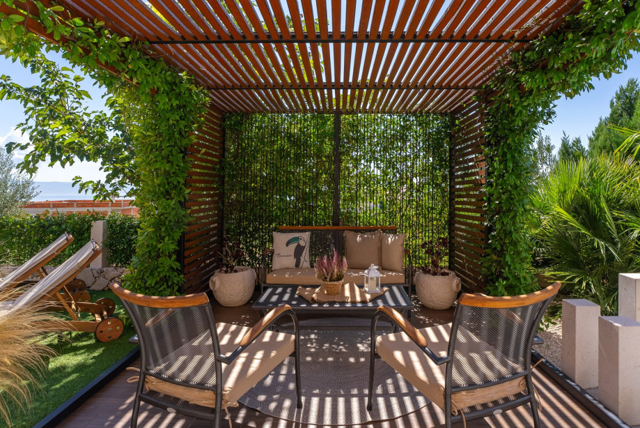 a shaded, cozy, and relaxing area perfect for enjoying your morning coffee or afternoon tea