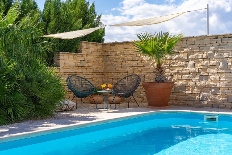 32 square meters pool, with 8 deck chairs