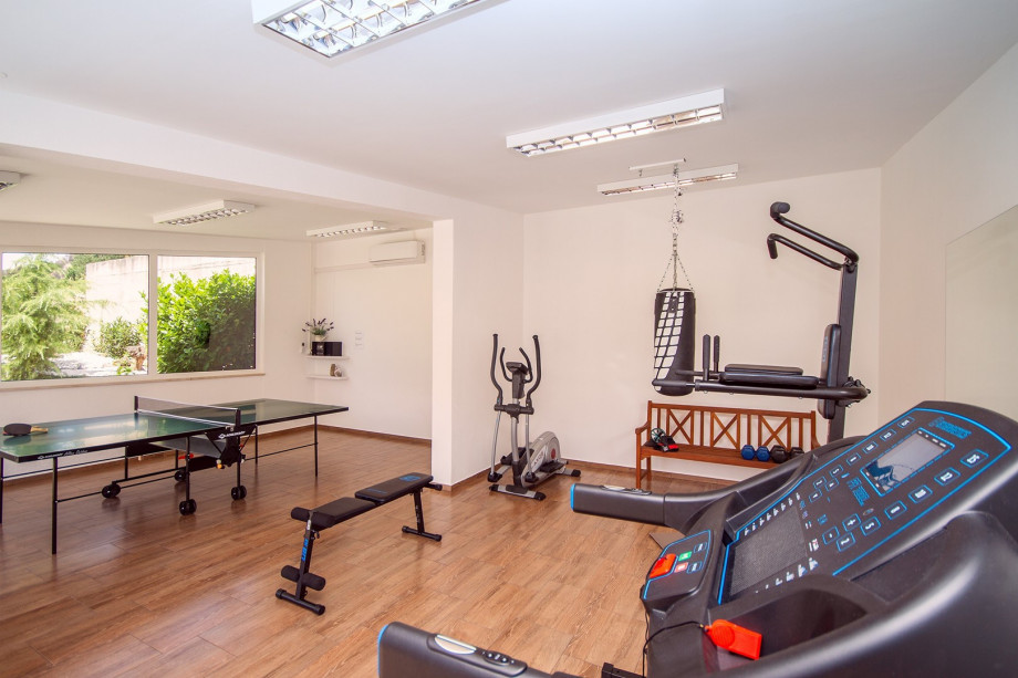 a well-equipped gym and a table tennis setup to ensure you can stay active and entertained during your stay