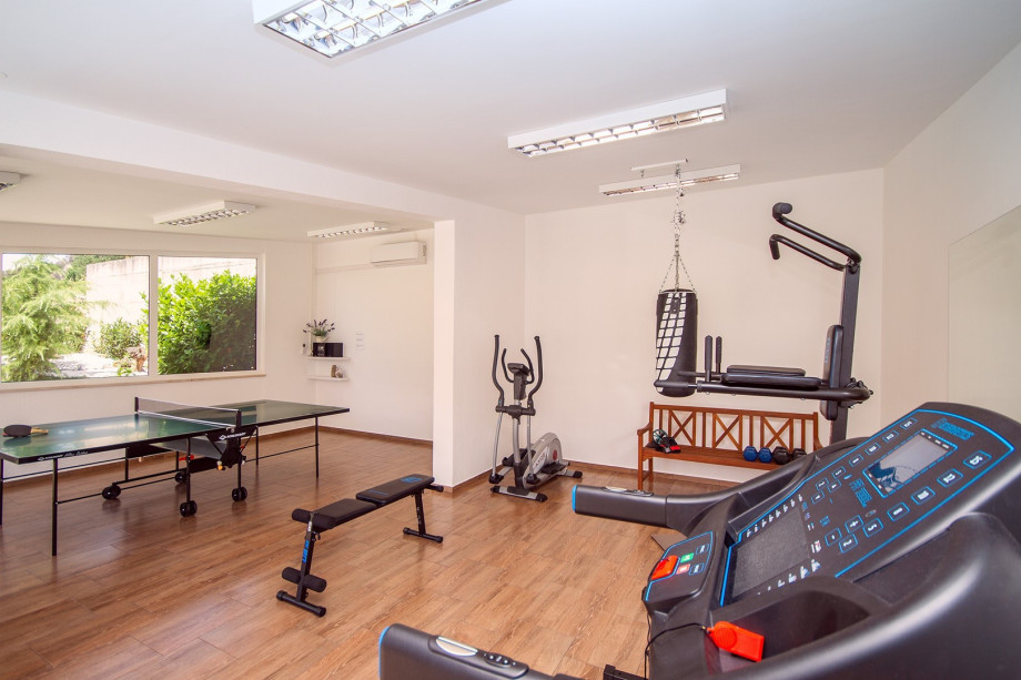 a well-equipped gym and a table tennis setup to ensure you can stay active and entertained during your stay