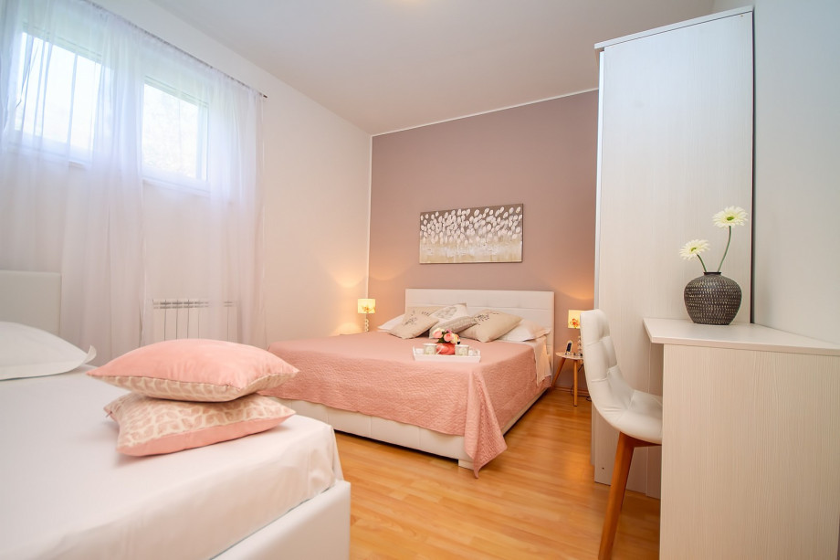 Bedroom 1 with a  king-size bed and a single bed