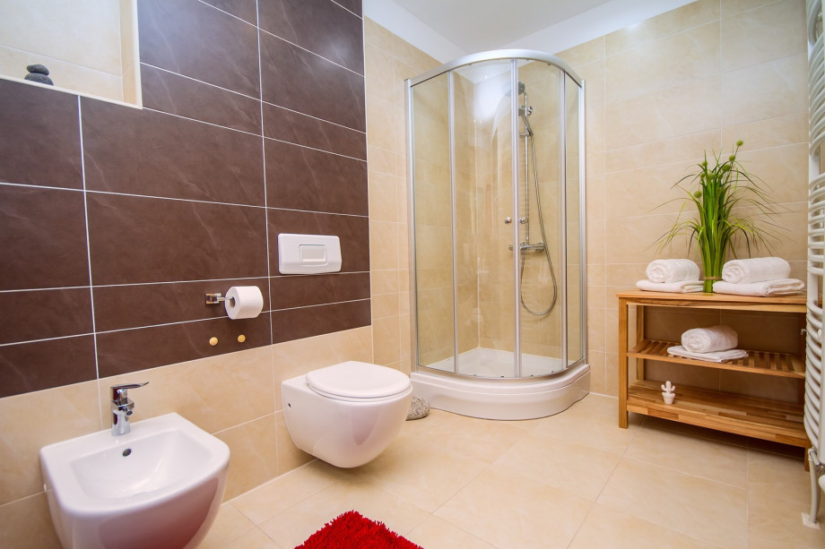 One family bathroom with a shower