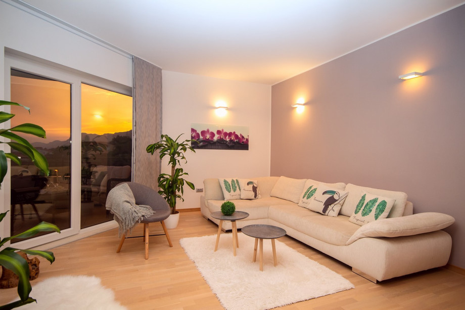 air-conditioned living and dining area with a fully equipped kitchen