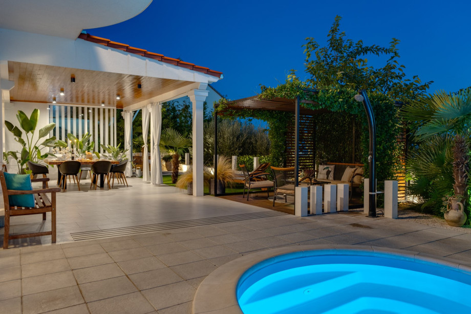 32 square meters pool, with 8 deck chairs