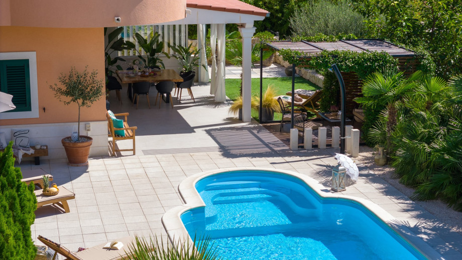 32 square meters pool, with 8 deck chairs