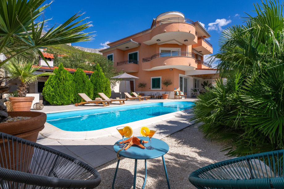 32 square meters pool, with 8 deck chairs