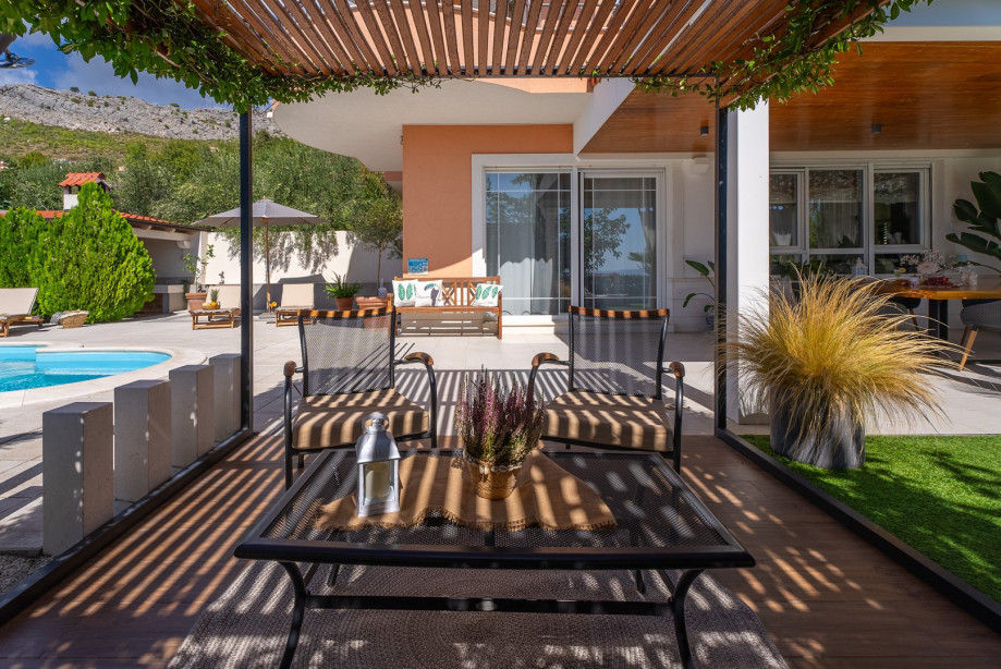 a shaded, cozy, and relaxing area perfect for enjoying your morning coffee or afternoon tea