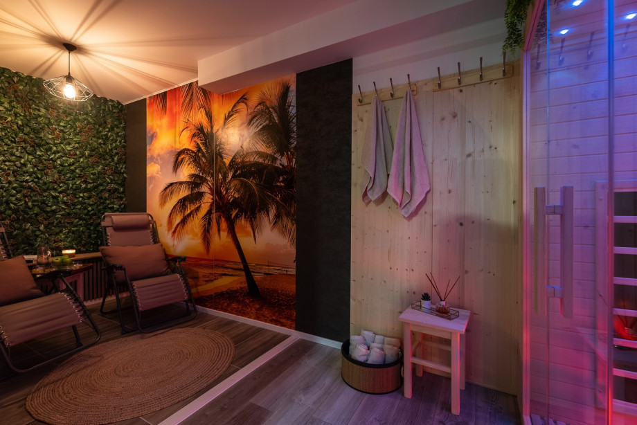 Basement offers: An infrared Sauna, a workout area with a bench, a treadmill, and weighted Pilates equipment are available in the basement