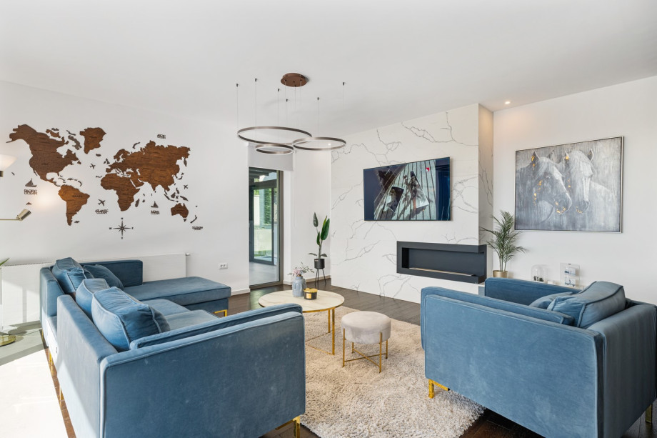 There are three distinct artificial grass grassplot areas in front of the pool area, each with the natural shade of pine trees from your courtyard