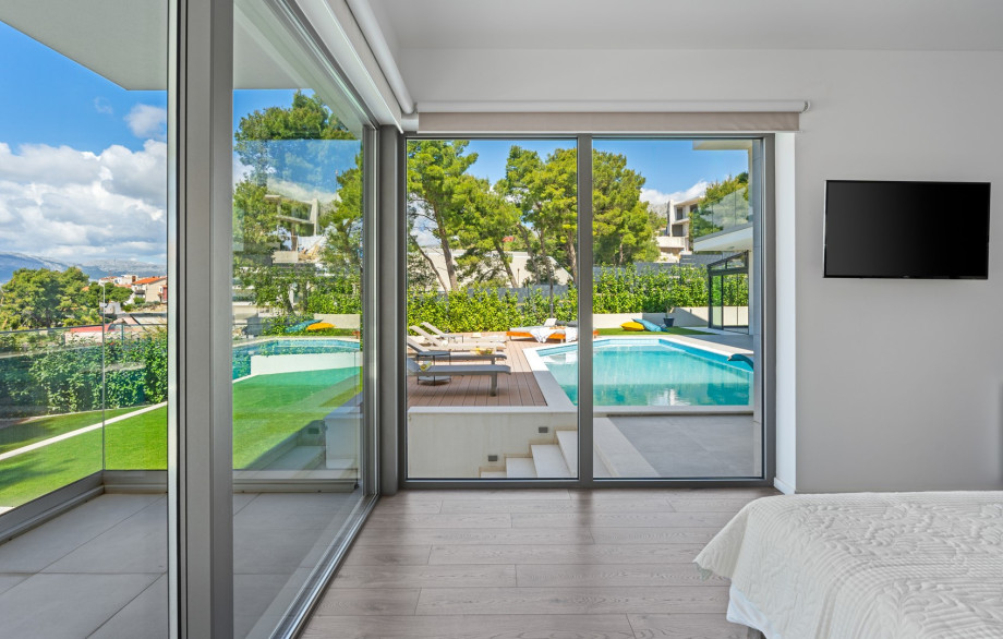 Stylish 5-bedroom villa Aride with heated pool, gym, pool table, sauna, sea views