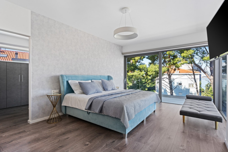 Bedroom No. 4 features a 200cm by 200cm super king-size bed