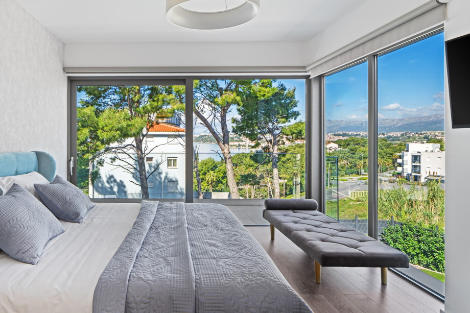 Bedroom No. 4 features a 200cm by 200cm super king-size bed