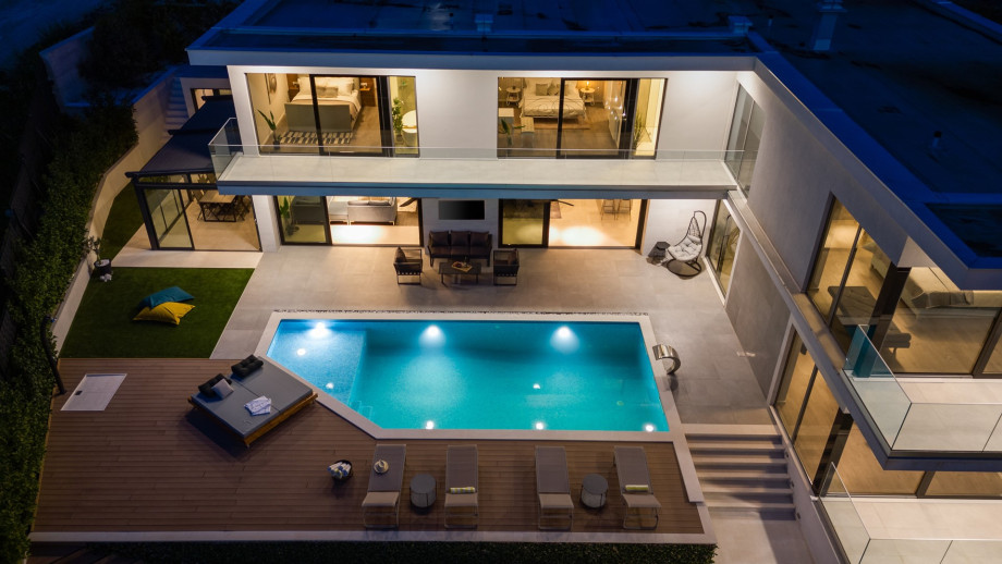 Five automobiles can be safely parked on a private plot