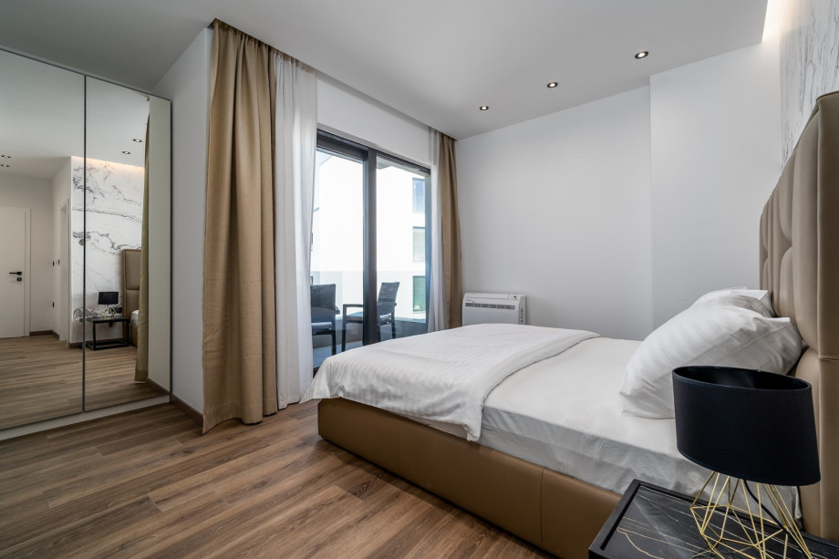 Bedroom No2 with king size bed 180cm x 200cm with sea views, en-suite bathroom with a shower, air-conditioning, a balcony with sea views