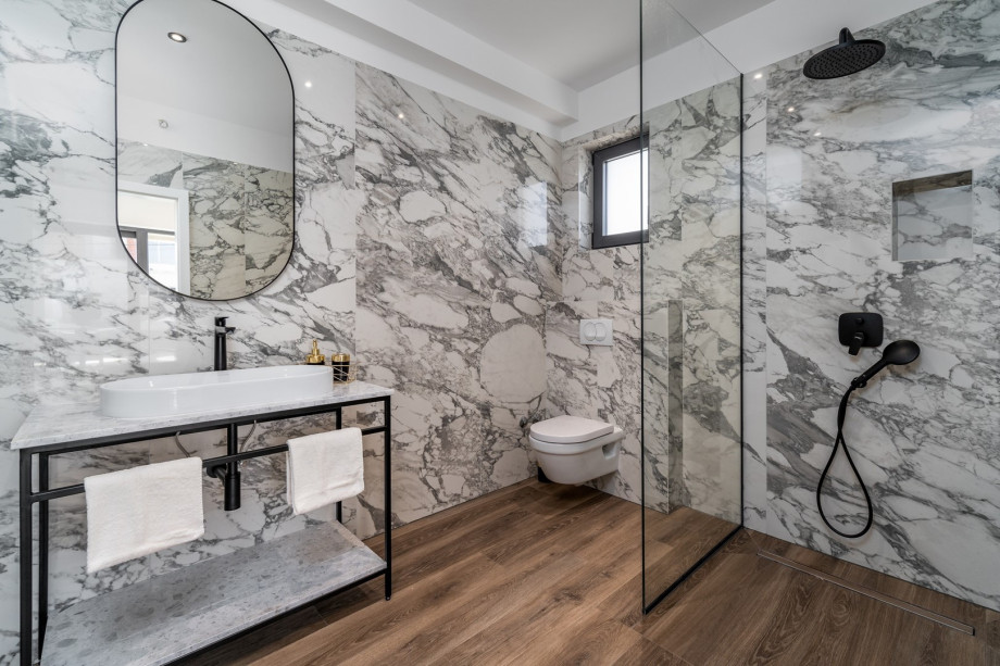 En-suite bathroom with a showe