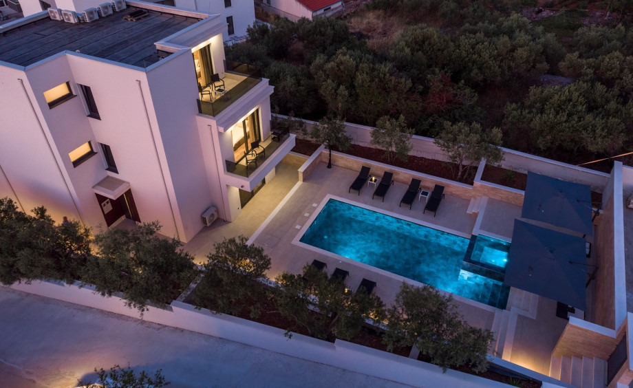 There are 5 parking places secured on the private parking lot in front of the house