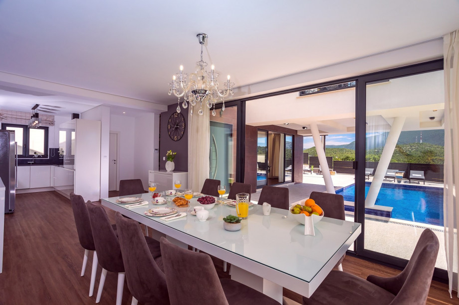 fully equipped kitchen with all the amenities and appliances you need for a comfortable stay and family dining