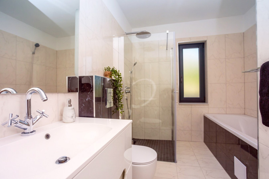 family Bathroom No2 with a bathtub and a shower