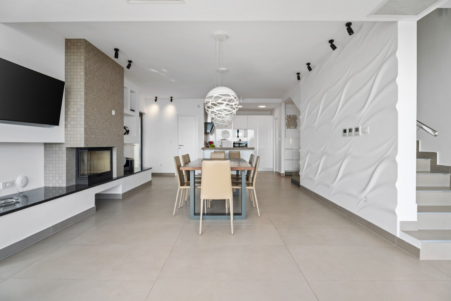 Spacius living and dining room with an open sea view