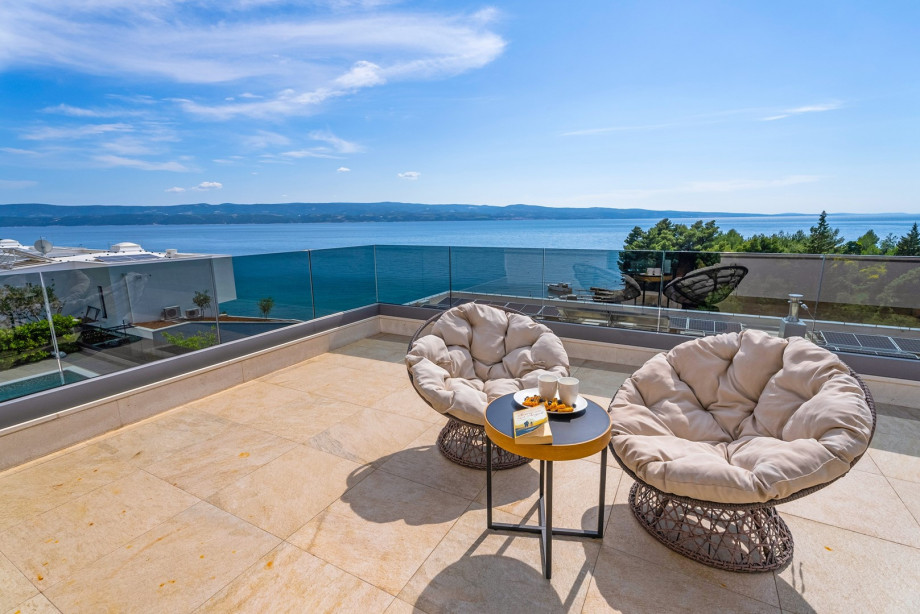 Spacious terrace in front of 2 bedrooms with amazing sea views