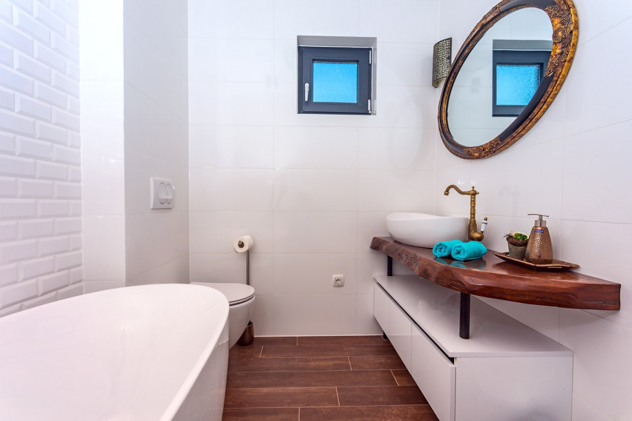 Family bathroom with bathtub