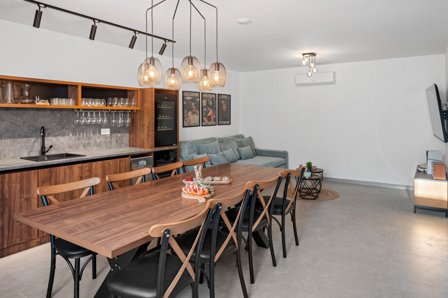 Enjoy entertainment on the large flat-screen TV with PlayStation 5