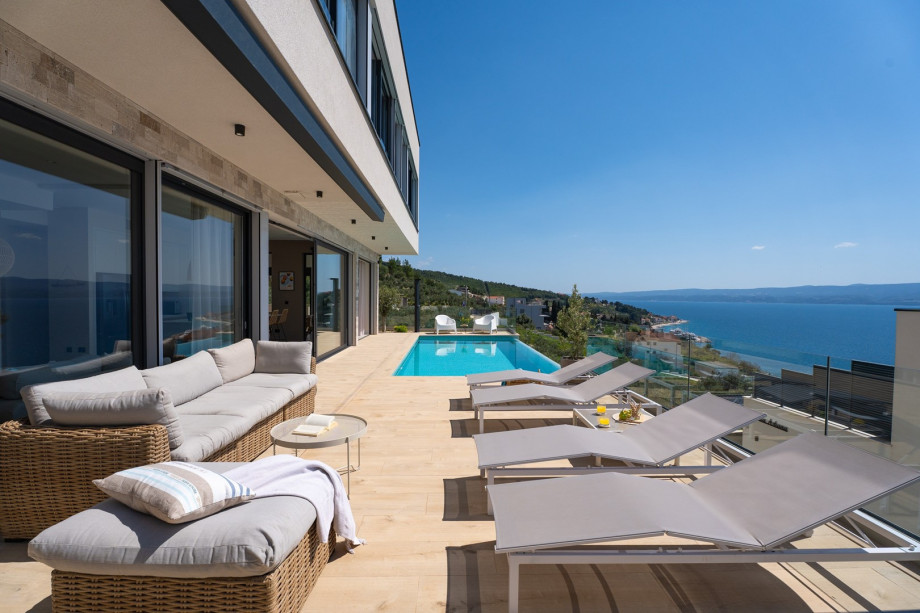 This house boasts breathtaking views of the Adriatic Sea and offers a perfect blend of luxury, comfort, and tranquility.