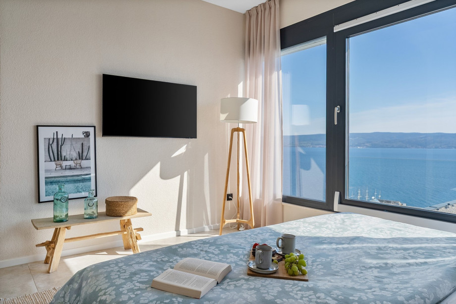 Bedroom NO1 with a view of the pool.