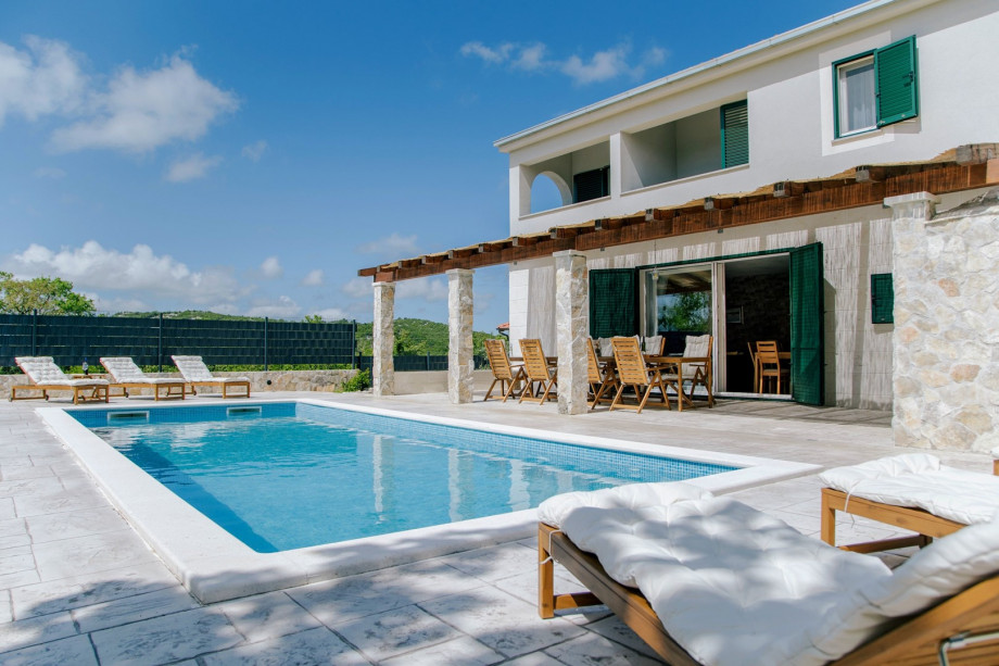 Escape to the serene village of Blizna Gornja, nestled in the Trogir hinterland, and discover Villa Admiral