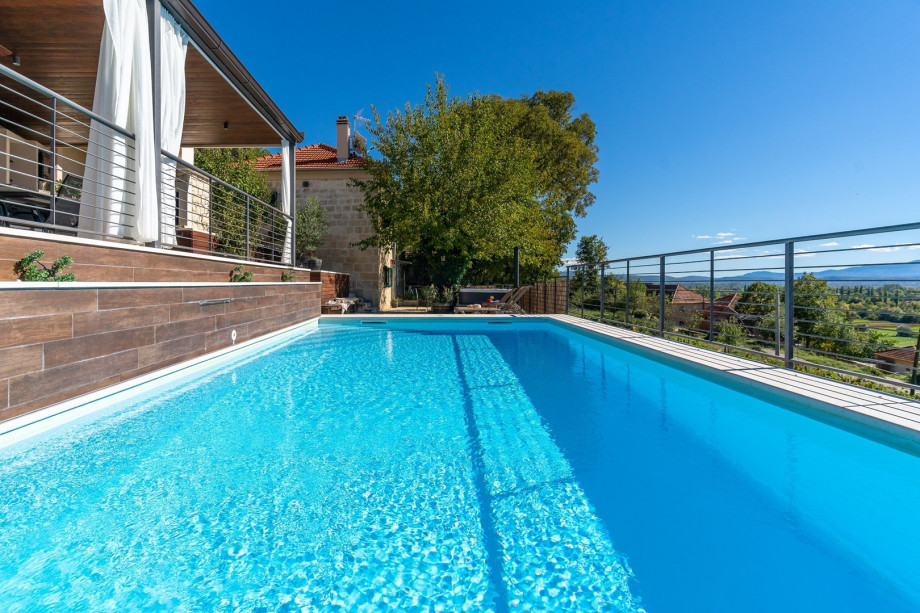 Villa Little Arya with heated pool, hot tub, and 4 bedrooms.