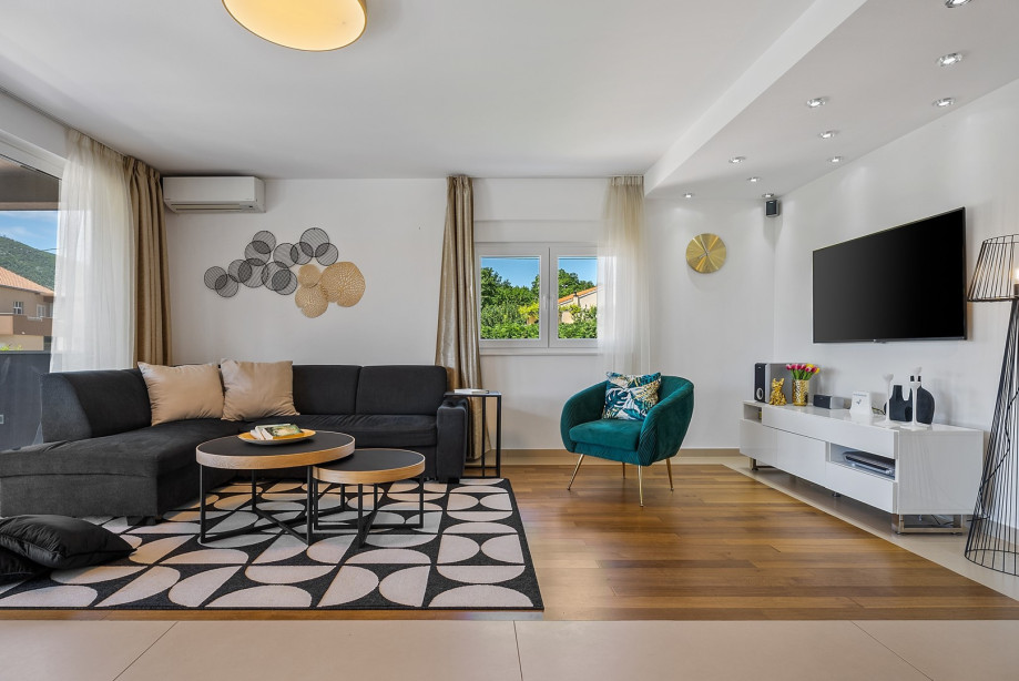 A spacious living room with a comfortable sofa